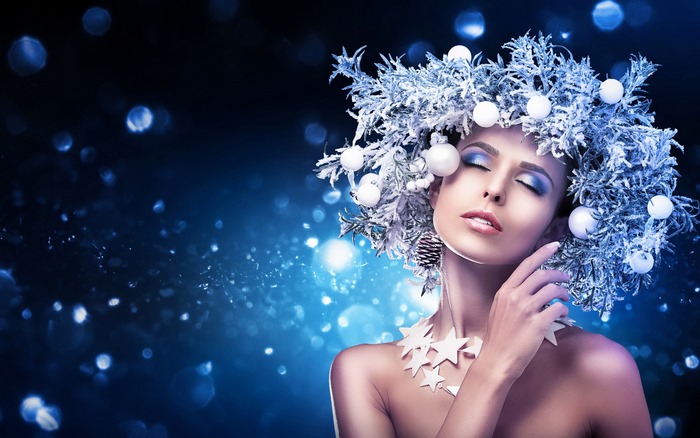Woman with winter wreath and star necklace