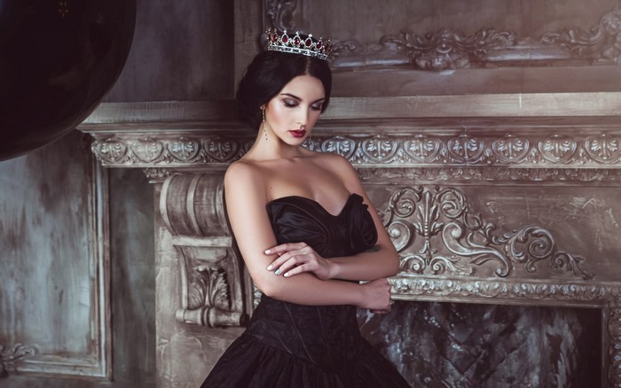 Elegant Model in Black Dress and Crown