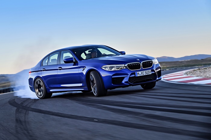 Blue BMW M5 4K drifting on a race track