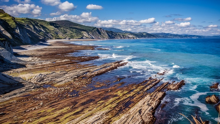 Rugged Coastline with Cliffs and Ocean Waves