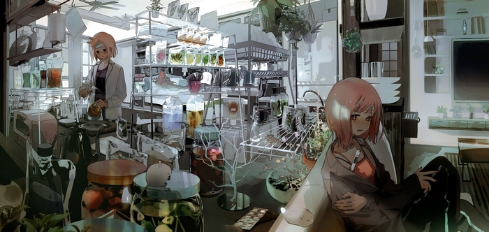 Two women in a laboratory-like room with plants
