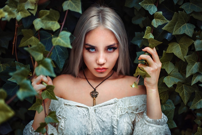 Woman with blonde hair and blue eyes