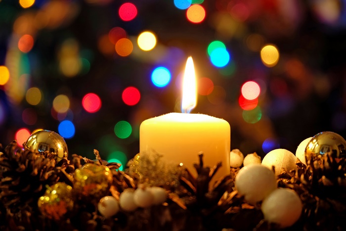 Candle with Christmas Bokeh and Ornaments