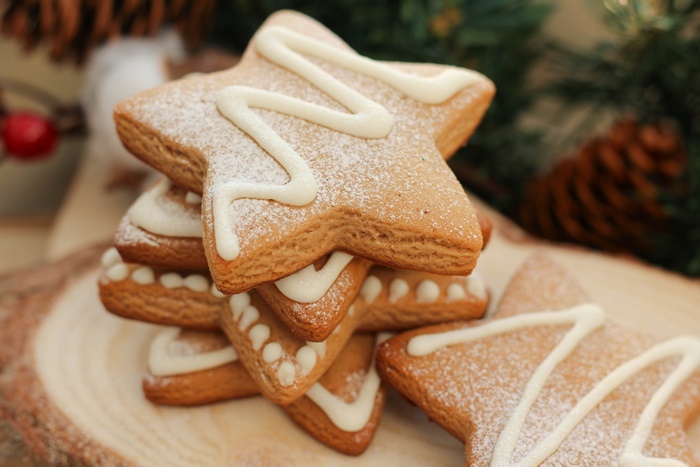 Christmas star cookies with icing and powdered sugar