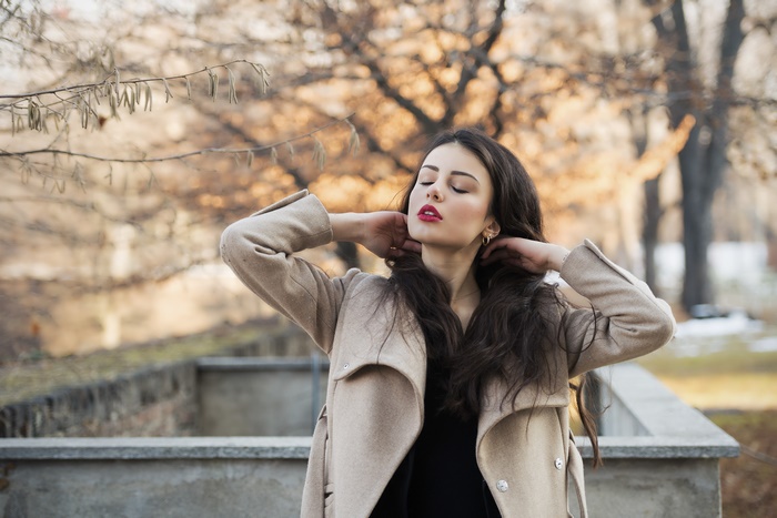 Woman with long hair wearing a coat