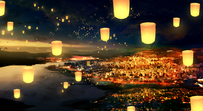 Lanterns floating over a city at night