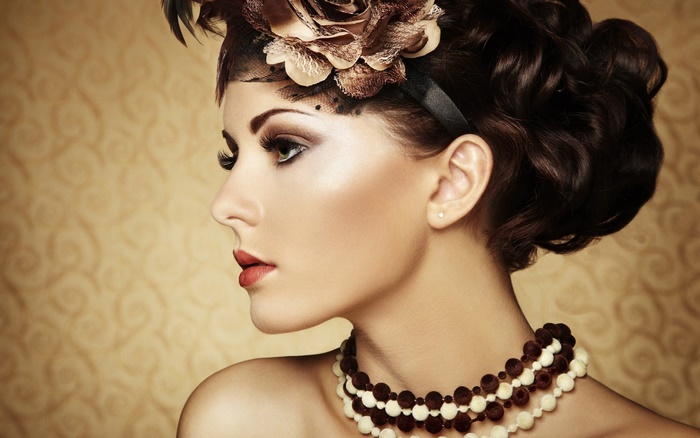 Woman with Vintage Style and Floral Headpiece