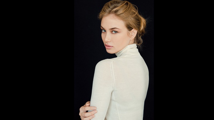 Aleksandra Nikolic blonde woman in turtleneck