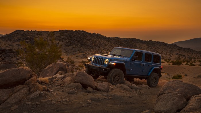 Blue Jeep Wrangler Rubicon 392 in Desert at Sunset