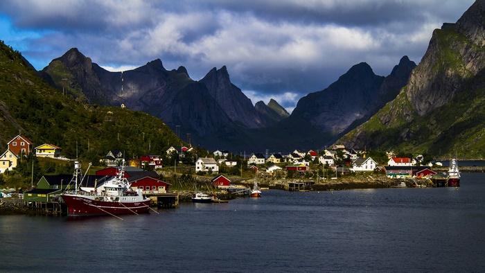 Lofoten village with mountains and sea