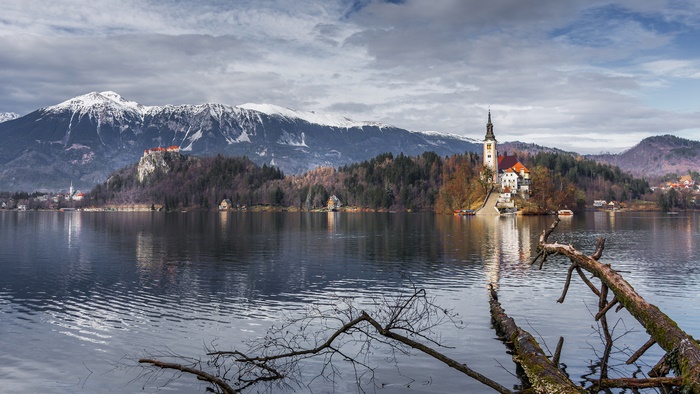 Church on Island with Mountains and Lake