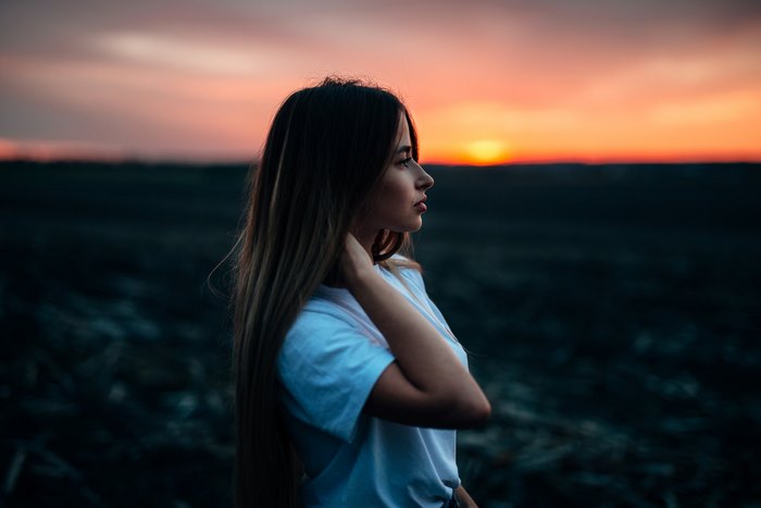 Woman in Profile Against Sunset