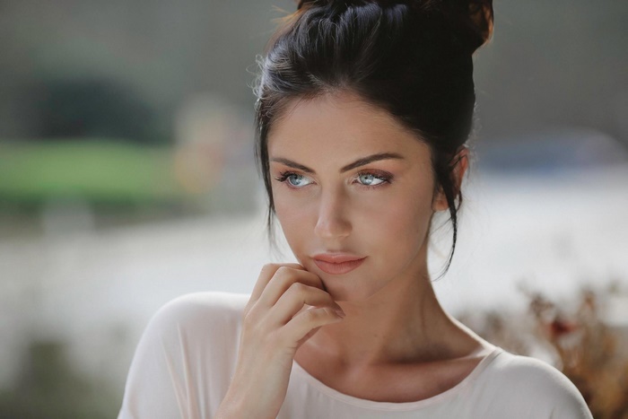 Woman with blue eyes and black hair