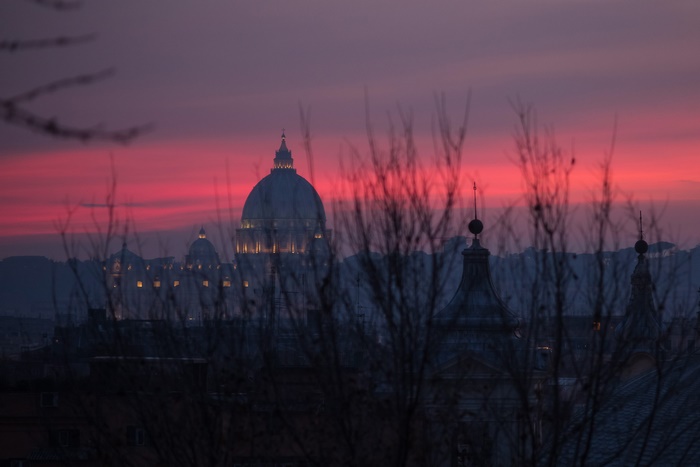St. Peter's Basilica at sunset in Rome, Italy