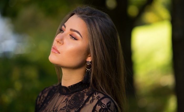Brunette Woman in Elegant Black Lace Dress