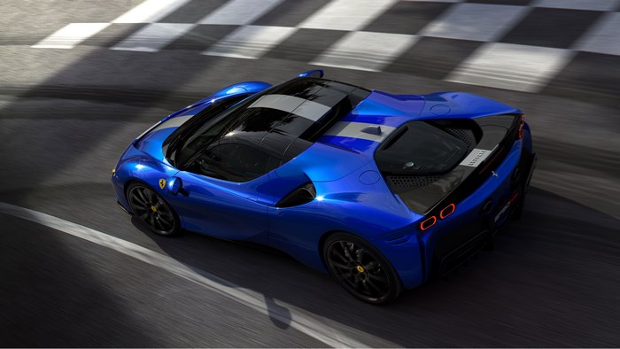 Blue Ferrari SF90 Spider on a Racetrack