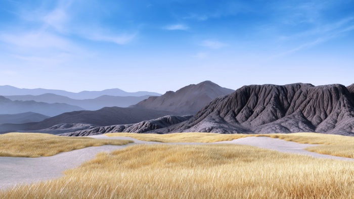 Mountain landscape with dry grass and blue sky