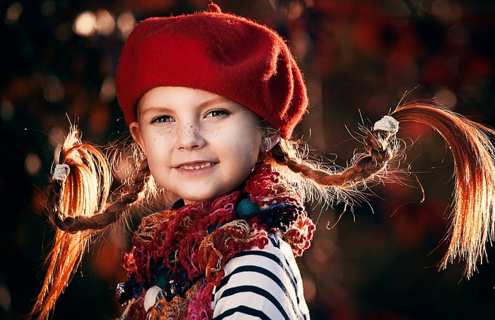 Girl with red beret and braids