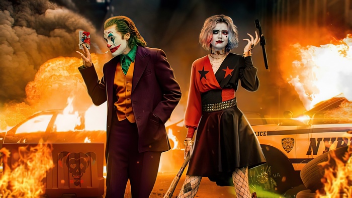 Joker and Harley Quinn in front of burning car