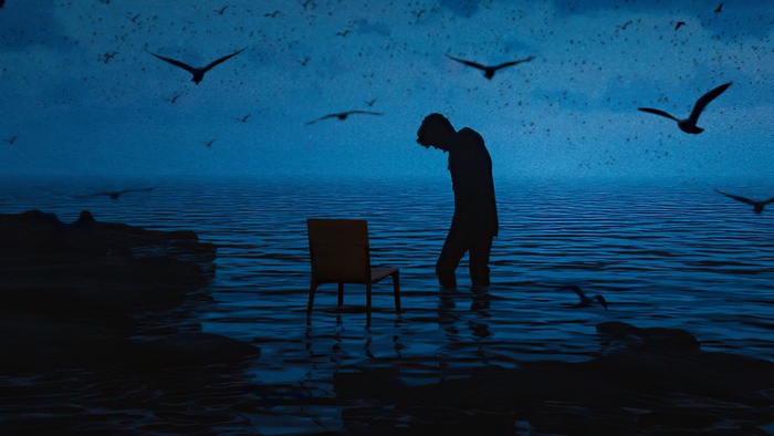 Lonely figure standing in water at dusk with birds flying