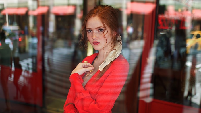 Redhead woman in red dress with scarf