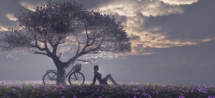 Woman sitting under a tree with a bicycle in a field of flowers