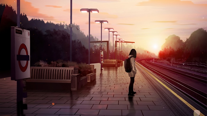 Girl waiting at a train station at sunset