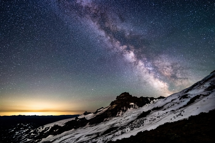 Milky Way over snow-covered mountains