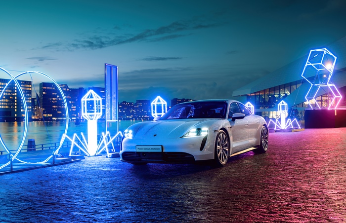 White Porsche Taycan Turbo S with Neon Lights