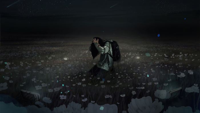 Person in a field of flowers at night