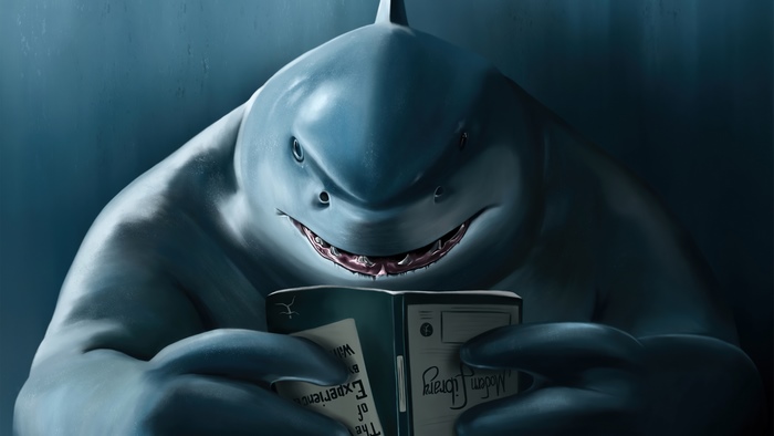 King Shark reading a book