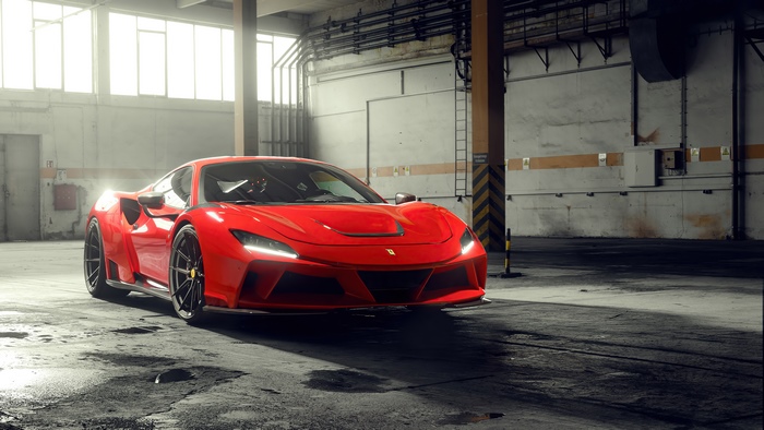 Red Ferrari F8 Tributo in a warehouse