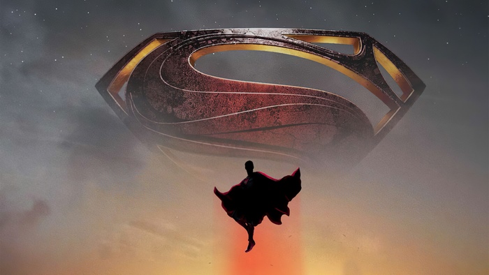 Superman flying with the Kryptonian symbol