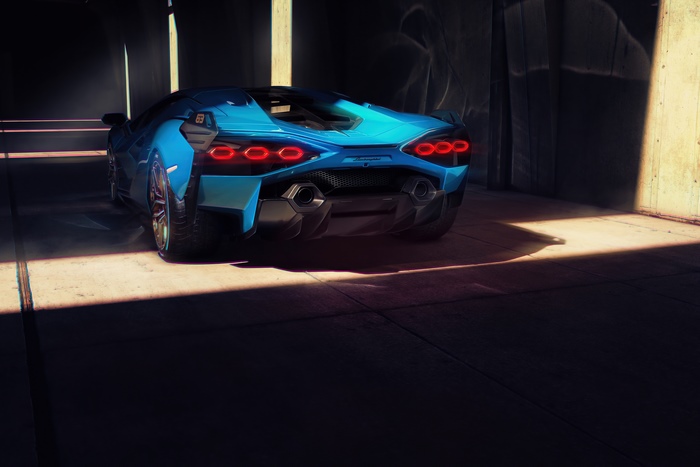 Blue Lamborghini Sian parked in a garage