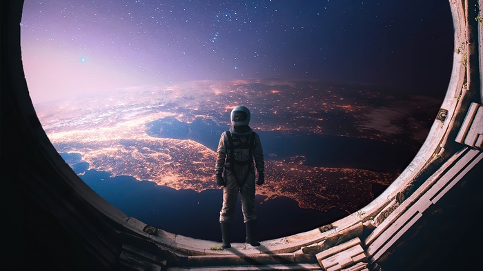 Astronaut looking at Earth from space