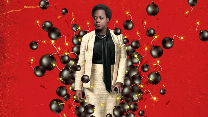 Amanda Waller from The Suicide Squad surrounded by bombs