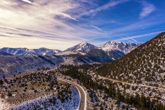 Snowy Mountains and Winding Road in Nature