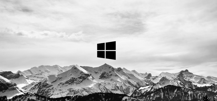 Microsoft Windows Logo over Snowy Mountains