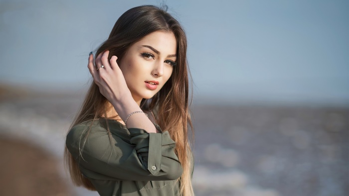 Elegant Model Posing Outdoors in Natural Light
