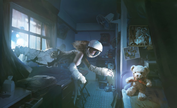 Astronaut in a room with a teddy bear