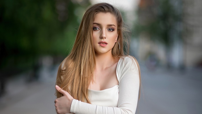 Blonde girl with hoop earrings