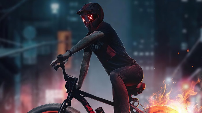 BMX rider with glowing mask and burning wheel