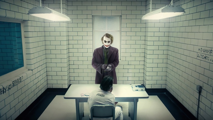 Joker in an interrogation room