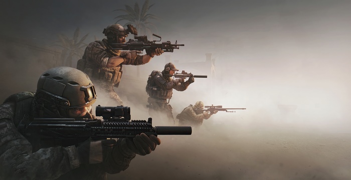 Soldiers aiming rifles in a dusty environment