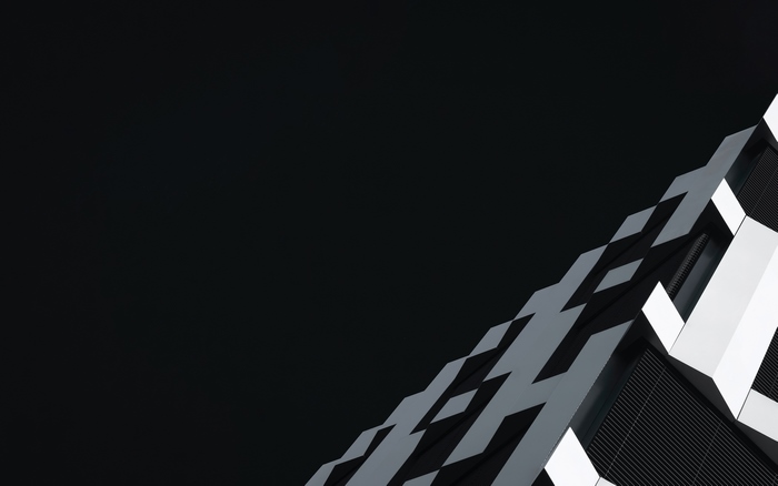 Abstract architectural detail against a dark background