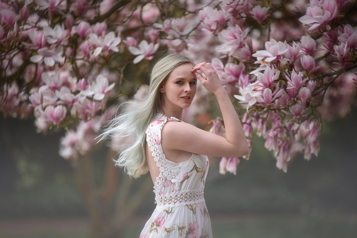 Woman Among Magnolia Flowers