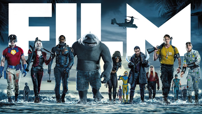 The Suicide Squad characters on a beach with large letters