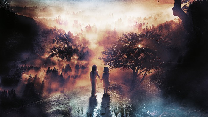 Two girls holding hands in a misty forest