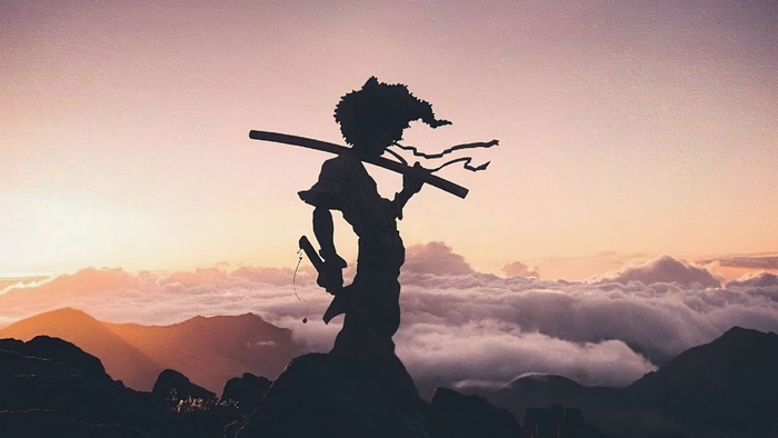Afro Samurai Silhouette at Sunset Over Mountains
