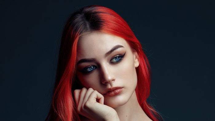 Woman with red hair and blue eyes